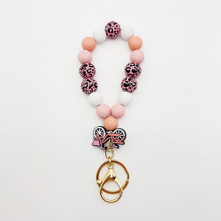 Wholesale Silicone Pumpkin Cow Ghost Dog Paw Wooden Bead Bracelet Keychain